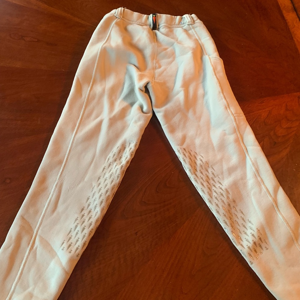 Kerrits girls warm tights. Tan size med